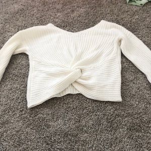 White sweater with twist in back